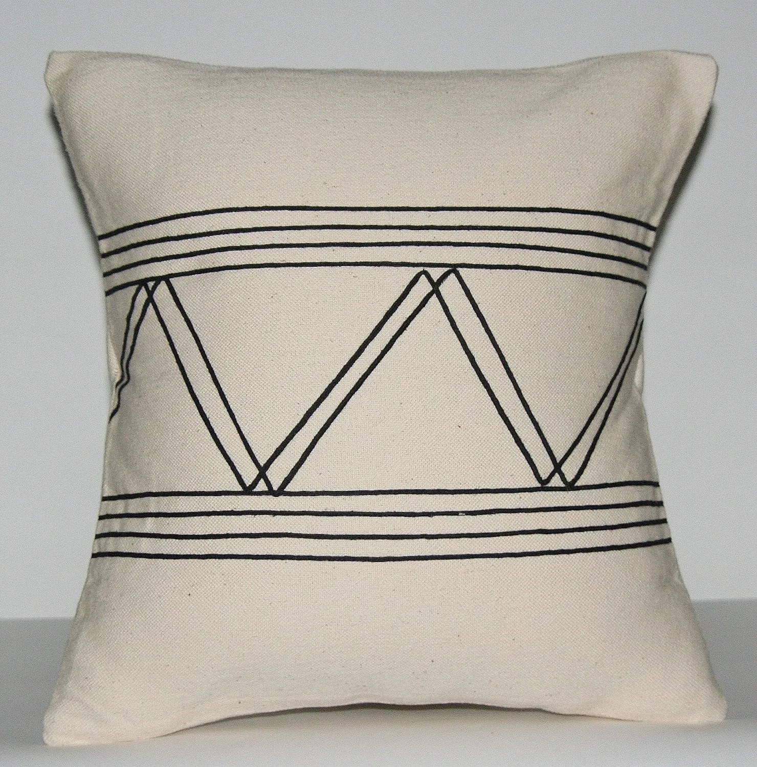 African Pillow Ivory With Black Applique Tribal Designs  16" X 15.5"