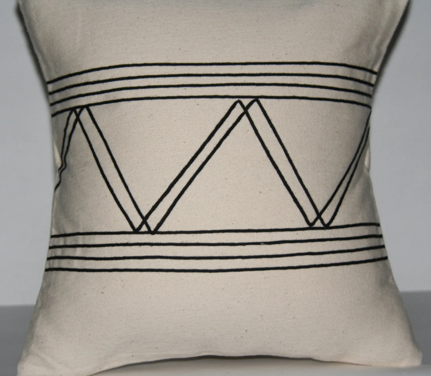 African Pillow Ivory With Black Applique Tribal Designs  16" X 15.5"