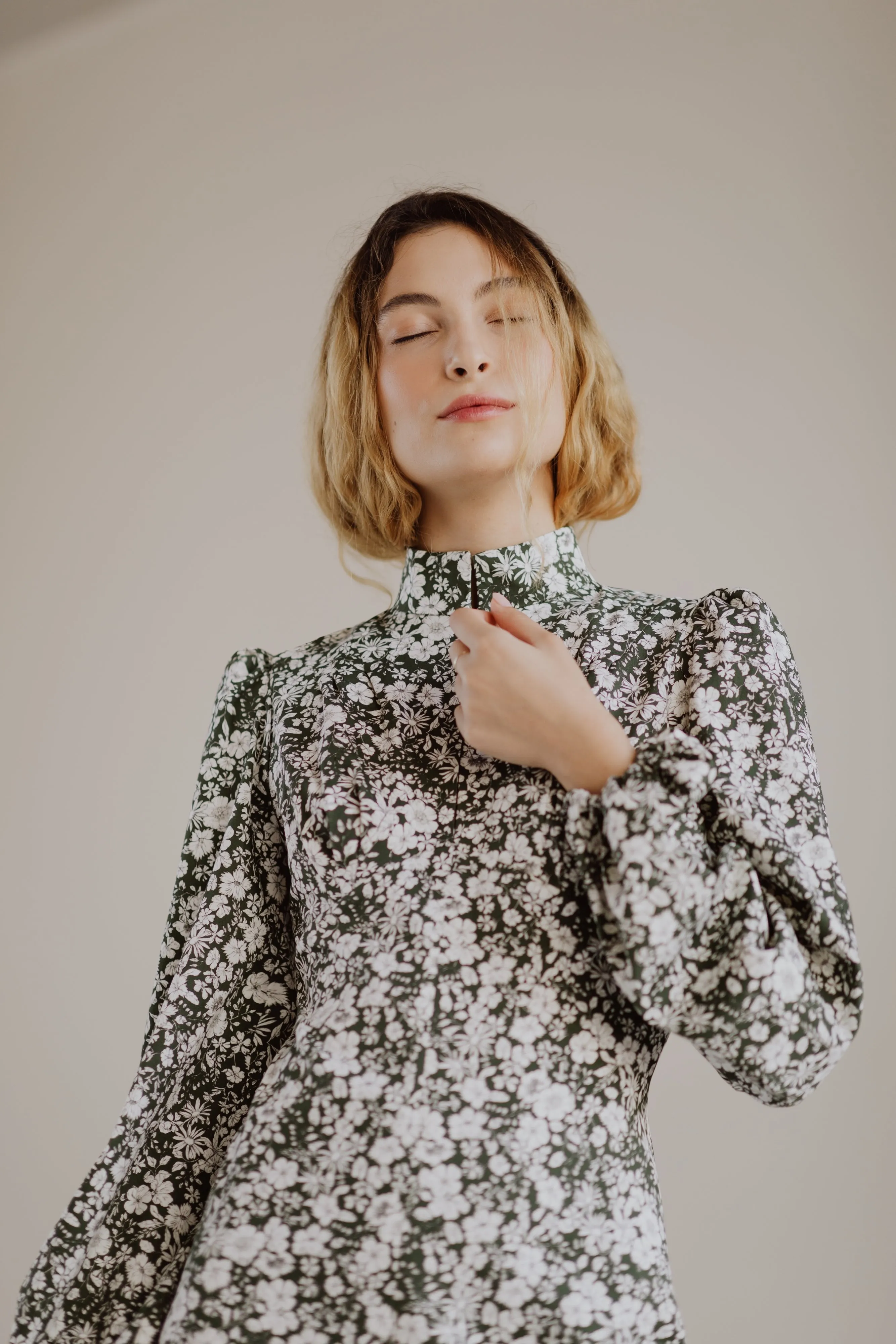 Jane High Neck Empire Mini Dress with Hook and Eye Detail and Blouson Sleeves / Forest Green and Milky White Floral Cotton